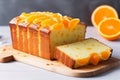 Orange homemade pound cake. Moist loaf with orange zest on bright background. Generative AI