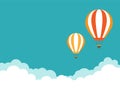 Orange hot air balloon flying in blue sky with clouds. Flat cartoon horizontal background Royalty Free Stock Photo