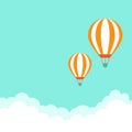 Orange hot air balloon flying in blue sky with clouds. Flat cartoon horizontal background Royalty Free Stock Photo