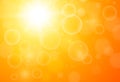 Orange hot sunny background, sun with bokeh, blazing hot sun on a hot summer day Royalty Free Stock Photo