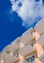 Orange Hotel in front of a blue sky Royalty Free Stock Photo