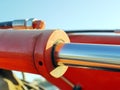 Orange hydraulic cylinder