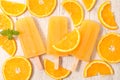 Orange ice cream popsicles