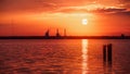Orange industrial seascape at sunset