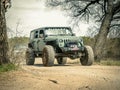 Orange Jeep Rock Crawling