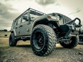 Orange Jeep Rock Crawling