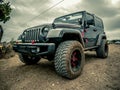 Orange Jeep Rock Crawling