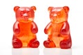 Orange jelly bear fruit gum candies on white background