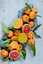 Orange juice in a glass.Citrus fruits orange, lemon, grapefruit, mandarin, lime. Fresh fruits. Mixed fruits background. Royalty Free Stock Photo