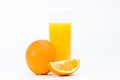 Orange with juice in the glass, isolated