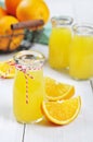 Orange juice in glass jars