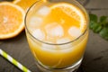 Orange juice in glass with mint, fresh fruits. selective focus, Royalty Free Stock Photo