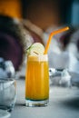Orange juice in a glass. Photo of drinks on dark background Royalty Free Stock Photo
