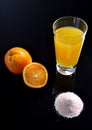 Orange juice glass, sliced orange and juice powder Royalty Free Stock Photo