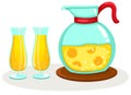 Orange juice in a jug and glasses