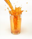 Orange juice pouring into a glass, forming a splash.