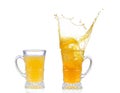 Orange juice splash in glass isolated on white Royalty Free Stock Photo