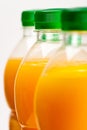 Orange juice three bottles background