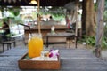 Orange juice on wooden tray Royalty Free Stock Photo