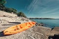 Orange kayak is on the sea pier, Adriatic seaside od Croatia Royalty Free Stock Photo