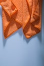 Orange kitchen washcloth on white background Royalty Free Stock Photo