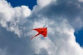 Orange kite in the sky Royalty Free Stock Photo