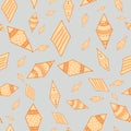 Orange kites shapes scattered on gray background Seamless pattern Vector hand drawn doodle style illustration