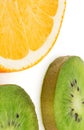 Orange and kiwi fruit cut into rings close up Royalty Free Stock Photo