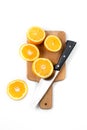 Orange knife on wooden desk isolated Royalty Free Stock Photo
