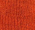 Orange knitted scarf texture