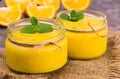 Orange Kurd in low jars. Orange summer, refreshing dessert. Close-up. Royalty Free Stock Photo