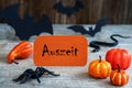 Orange Label, Text Auszeit Means Downtime, Scary Halloween Decoration