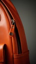 An orange leather backpack with a zipper, AI