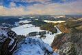 Orange leaves trees with first snow durring autumn. Morning view with snow after sunrise, orange landscape, Jetrichovice Bohemian Royalty Free Stock Photo