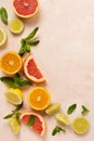 Orange, lemon, grapefruit, mandarin and lime on trendy pink stone or concrete table background. Citrus fruits. Top view, flat lay Royalty Free Stock Photo