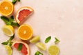 Orange, lemon, grapefruit, mandarin and lime on trendy pink stone or concrete table background. Citrus fruits. Top view, flat lay Royalty Free Stock Photo
