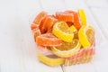 Orange and lemon jelly slices on white background Royalty Free Stock Photo