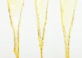 Orange, lemon juice or oil lubricant splash, liquid gold yellow drink drops. Fruit beverage water elements in line form . Fresh Royalty Free Stock Photo