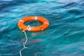 Orange life buoy safety equipment Royalty Free Stock Photo