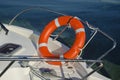 Orange life buoy on yacht Royalty Free Stock Photo