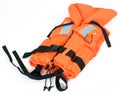 Orange life jacket isolated on white Royalty Free Stock Photo