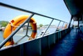 Orange Lifebuoy on ferry boat Royalty Free Stock Photo