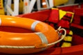 Orange Lifebuoy in front of boat Royalty Free Stock Photo