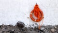 Orange lifebuoy hanging on white wall Royalty Free Stock Photo