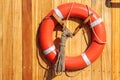 Orange lifebuoy on old sailing ship Royalty Free Stock Photo