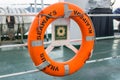 Orange lifebuoy on a passenger ferry Royalty Free Stock Photo