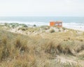 Orange lifeguard hut on the beach