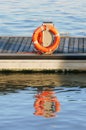 Orange lifeguard on port