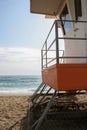 Orange lifeguard`s place on the seashore