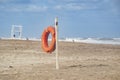 Orange lifeguard on a sandy beach in Argentina